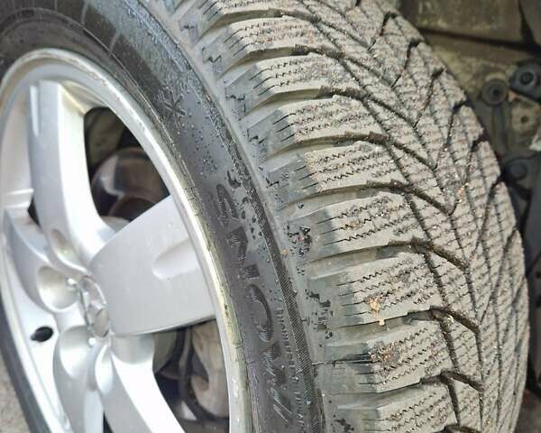 Серый Мицубиси Аутлендер, объемом двигателя 2.38 л и пробегом 113 тыс. км за 8900 $, фото 12 на Automoto.ua