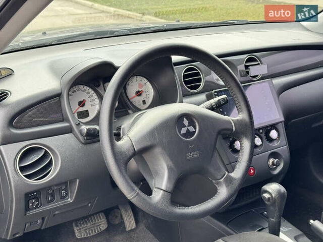 Серый Мицубиси Аутлендер, объемом двигателя 2.38 л и пробегом 254 тыс. км за 7300 $, фото 23 на Automoto.ua