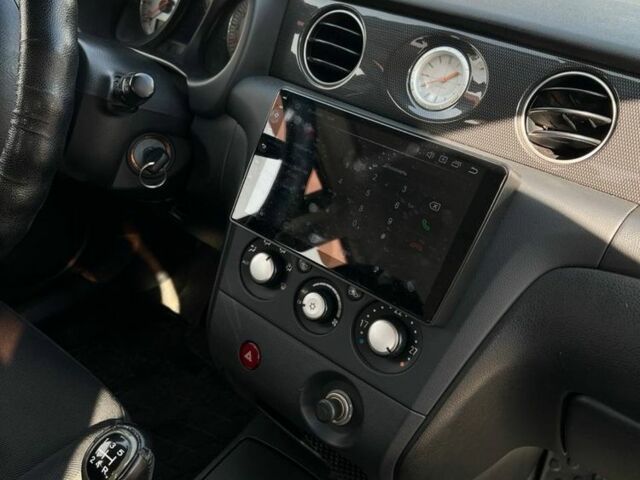 Серый Мицубиси Аутлендер, объемом двигателя 2 л и пробегом 214 тыс. км за 7300 $, фото 4 на Automoto.ua