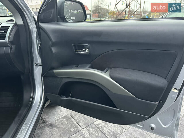 Серый Мицубиси Аутлендер, объемом двигателя 2.4 л и пробегом 61 тыс. км за 11300 $, фото 48 на Automoto.ua