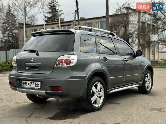 Серый Мицубиси Аутлендер, объемом двигателя 2.38 л и пробегом 254 тыс. км за 7300 $, фото 14 на Automoto.ua
