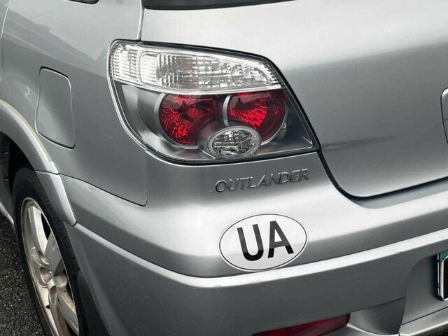 Сірий Міцубісі Аутлендер, об'ємом двигуна 2.4 л та пробігом 324 тис. км за 6890 $, фото 9 на Automoto.ua