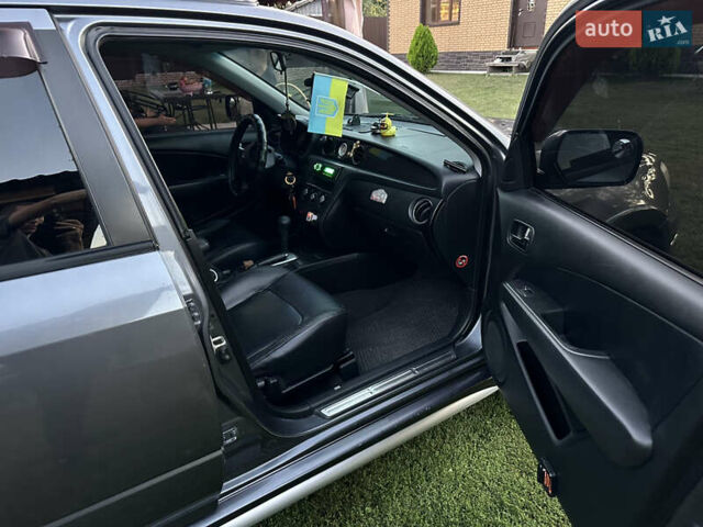 Сірий Міцубісі Аутлендер, об'ємом двигуна 2.38 л та пробігом 273 тис. км за 8000 $, фото 9 на Automoto.ua