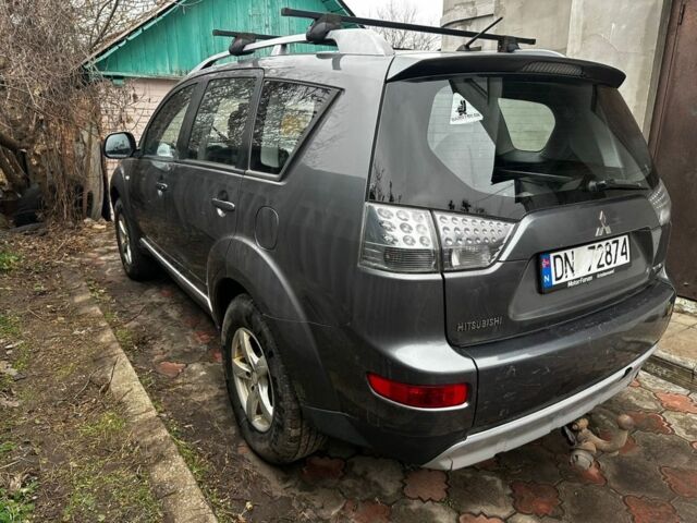 Сірий Міцубісі Аутлендер, об'ємом двигуна 2.4 л та пробігом 265 тис. км за 7000 $, фото 4 на Automoto.ua