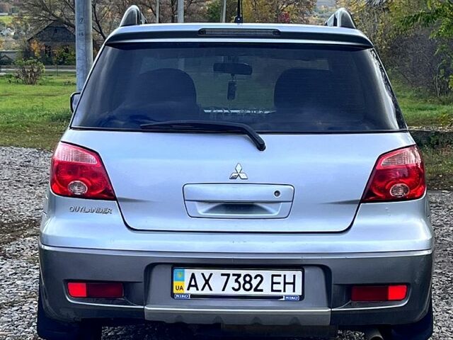 Сірий Міцубісі Аутлендер, об'ємом двигуна 2 л та пробігом 200 тис. км за 6400 $, фото 5 на Automoto.ua
