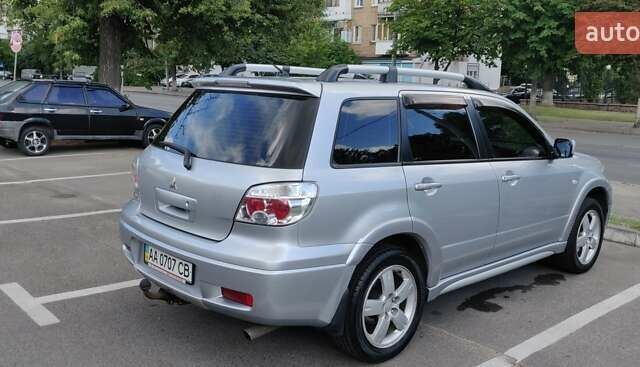 Серый Мицубиси Аутлендер, объемом двигателя 2.38 л и пробегом 323 тыс. км за 6800 $, фото 16 на Automoto.ua