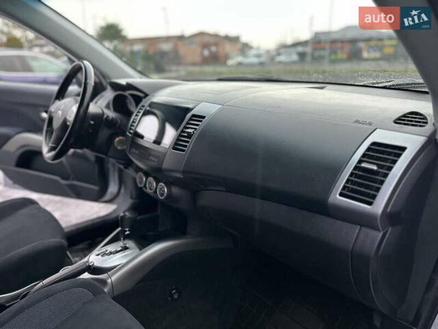 Серый Мицубиси Аутлендер, объемом двигателя 2.4 л и пробегом 61 тыс. км за 11300 $, фото 49 на Automoto.ua