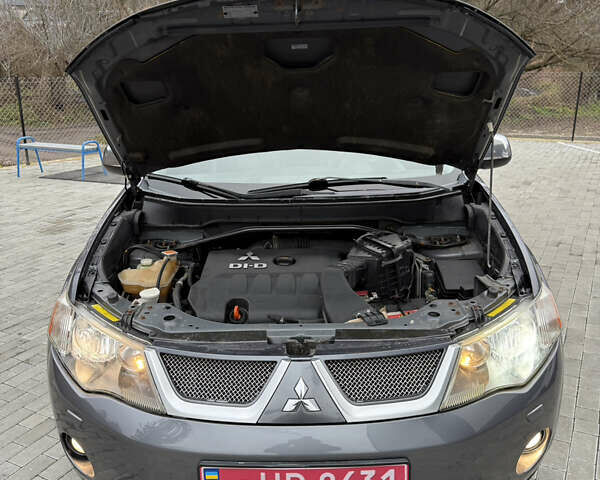 Сірий Міцубісі Аутлендер, об'ємом двигуна 2 л та пробігом 237 тис. км за 8999 $, фото 53 на Automoto.ua