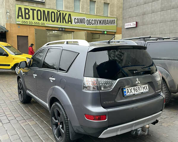 Серый Мицубиси Аутлендер, объемом двигателя 2.01 л и пробегом 345 тыс. км за 8100 $, фото 6 на Automoto.ua