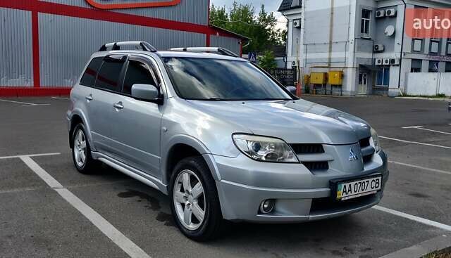 Серый Мицубиси Аутлендер, объемом двигателя 2.38 л и пробегом 323 тыс. км за 6800 $, фото 22 на Automoto.ua