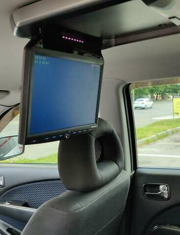 Серый Мицубиси Аутлендер, объемом двигателя 2.38 л и пробегом 323 тыс. км за 6800 $, фото 10 на Automoto.ua