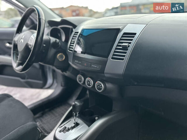 Серый Мицубиси Аутлендер, объемом двигателя 2.4 л и пробегом 61 тыс. км за 11300 $, фото 51 на Automoto.ua