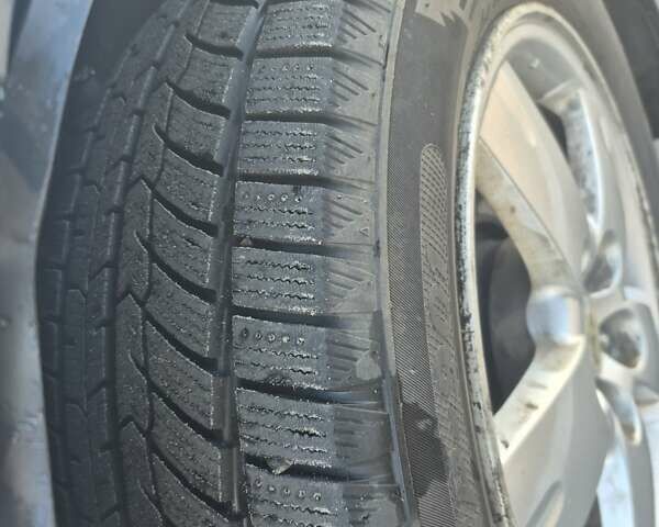 Сірий Міцубісі Аутлендер, об'ємом двигуна 2 л та пробігом 247 тис. км за 5600 $, фото 3 на Automoto.ua