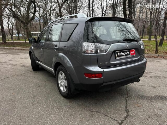 Серый Мицубиси Аутлендер, объемом двигателя 2.4 л и пробегом 237 тыс. км за 8490 $, фото 4 на Automoto.ua