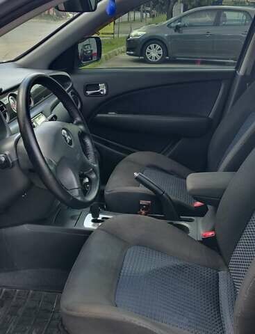 Серый Мицубиси Аутлендер, объемом двигателя 2.38 л и пробегом 323 тыс. км за 6800 $, фото 1 на Automoto.ua