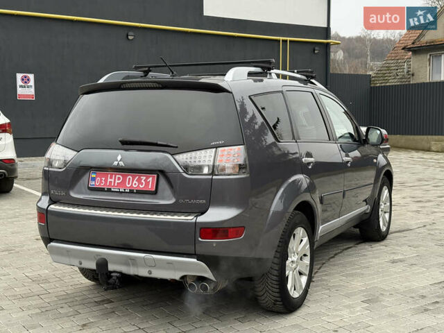 Сірий Міцубісі Аутлендер, об'ємом двигуна 2 л та пробігом 237 тис. км за 8999 $, фото 20 на Automoto.ua