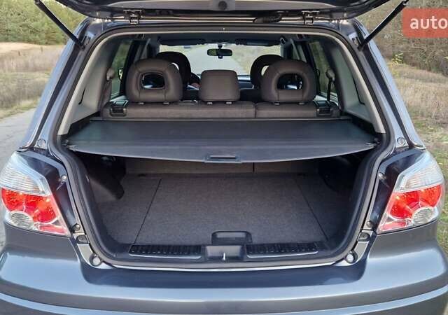 Серый Мицубиси Аутлендер, объемом двигателя 2 л и пробегом 157 тыс. км за 8300 $, фото 28 на Automoto.ua