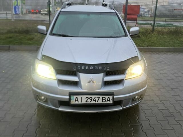 Сірий Міцубісі Аутлендер, об'ємом двигуна 2.4 л та пробігом 299 тис. км за 6300 $, фото 4 на Automoto.ua