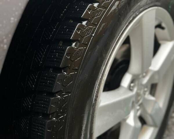 Серый Мицубиси Аутлендер, объемом двигателя 2.4 л и пробегом 238 тыс. км за 7200 $, фото 4 на Automoto.ua