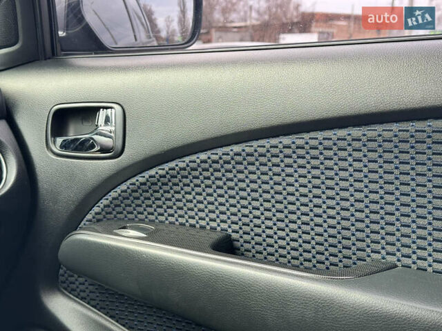 Серый Мицубиси Аутлендер, объемом двигателя 2.38 л и пробегом 254 тыс. км за 7300 $, фото 27 на Automoto.ua