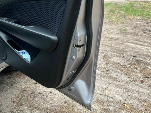 Серый Мицубиси Аутлендер, объемом двигателя 2.4 л и пробегом 225 тыс. км за 6500 $, фото 9 на Automoto.ua