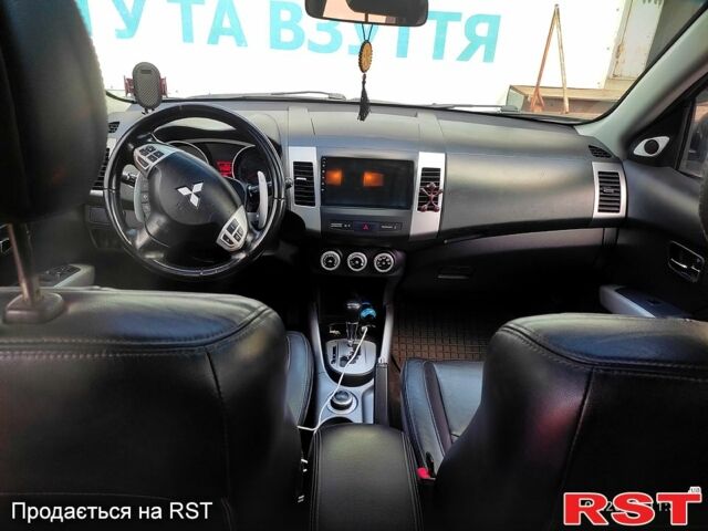 Серый Мицубиси Аутлендер, объемом двигателя 2.4 л и пробегом 216 тыс. км за 10500 $, фото 6 на Automoto.ua