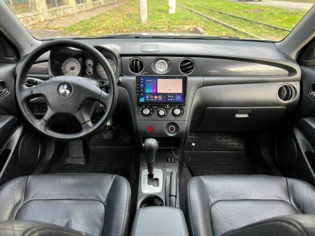 Серый Мицубиси Аутлендер, объемом двигателя 2.4 л и пробегом 170 тыс. км за 6900 $, фото 13 на Automoto.ua