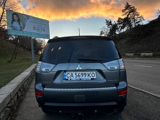 Серый Мицубиси Аутлендер, объемом двигателя 2.4 л и пробегом 321 тыс. км за 10000 $, фото 4 на Automoto.ua
