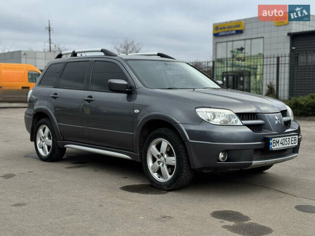 Серый Мицубиси Аутлендер, объемом двигателя 2.38 л и пробегом 254 тыс. км за 7300 $, фото 7 на Automoto.ua