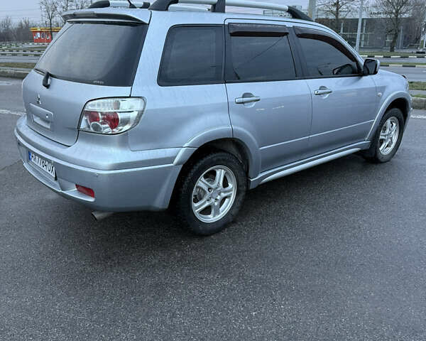 Сірий Міцубісі Аутлендер, об'ємом двигуна 2.4 л та пробігом 190 тис. км за 7500 $, фото 5 на Automoto.ua