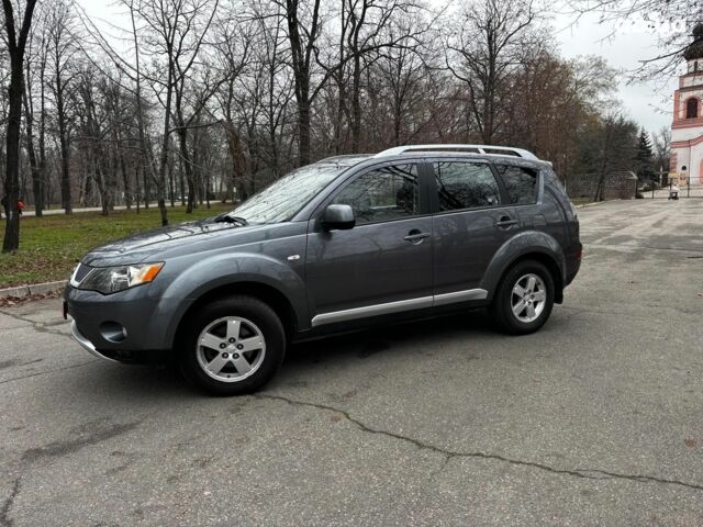 Серый Мицубиси Аутлендер, объемом двигателя 2.4 л и пробегом 237 тыс. км за 8490 $, фото 3 на Automoto.ua