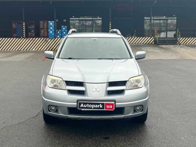 Сірий Міцубісі Аутлендер, об'ємом двигуна 2.4 л та пробігом 324 тис. км за 6890 $, фото 1 на Automoto.ua