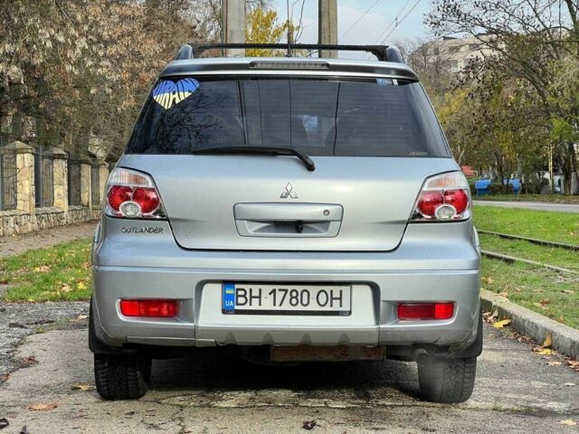 Серый Мицубиси Аутлендер, объемом двигателя 2.4 л и пробегом 170 тыс. км за 6900 $, фото 7 на Automoto.ua