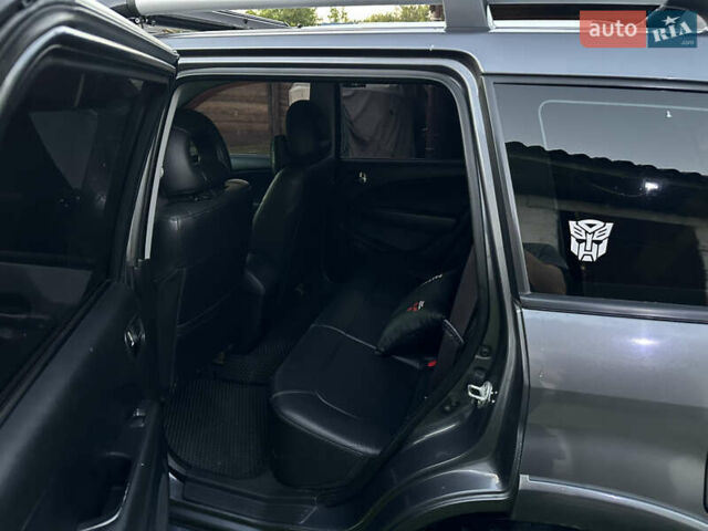 Сірий Міцубісі Аутлендер, об'ємом двигуна 2.38 л та пробігом 273 тис. км за 8000 $, фото 8 на Automoto.ua
