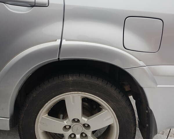 Серый Мицубиси Аутлендер, объемом двигателя 2.38 л и пробегом 700 тыс. км за 7058 $, фото 12 на Automoto.ua