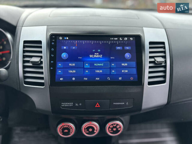 Серый Мицубиси Аутлендер, объемом двигателя 2.4 л и пробегом 61 тыс. км за 11300 $, фото 55 на Automoto.ua