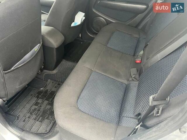 Серый Мицубиси Аутлендер, объемом двигателя 2.4 л и пробегом 324 тыс. км за 6890 $, фото 24 на Automoto.ua