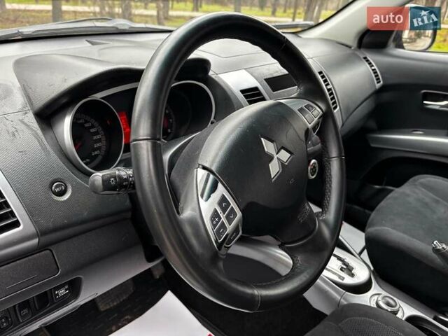 Серый Мицубиси Аутлендер, объемом двигателя 2.4 л и пробегом 237 тыс. км за 8490 $, фото 25 на Automoto.ua