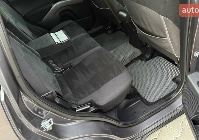 Серый Мицубиси Аутлендер, объемом двигателя 2.4 л и пробегом 174 тыс. км за 9599 $, фото 22 на Automoto.ua