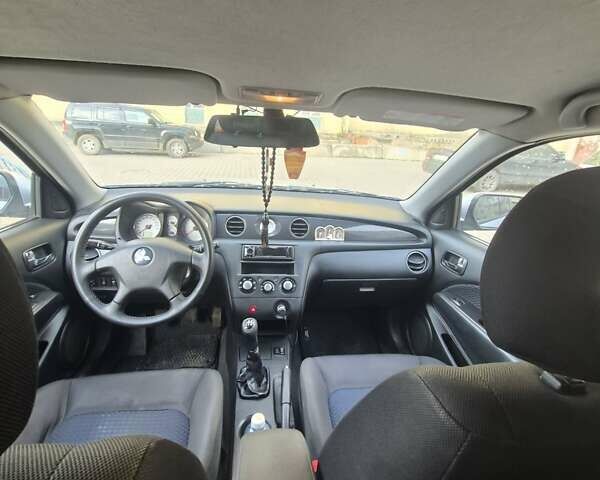 Сірий Міцубісі Аутлендер, об'ємом двигуна 2 л та пробігом 247 тис. км за 5600 $, фото 8 на Automoto.ua