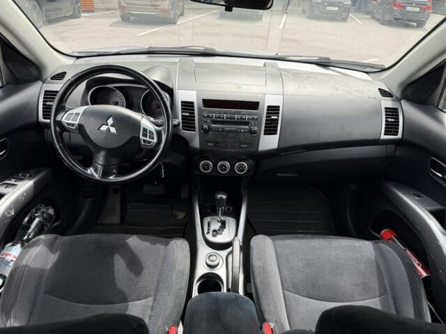 Серый Мицубиси Аутлендер, объемом двигателя 2.4 л и пробегом 208 тыс. км за 7600 $, фото 6 на Automoto.ua