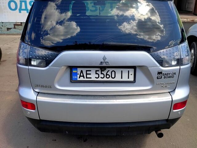 Серый Мицубиси Аутлендер, объемом двигателя 2.4 л и пробегом 216 тыс. км за 10500 $, фото 9 на Automoto.ua