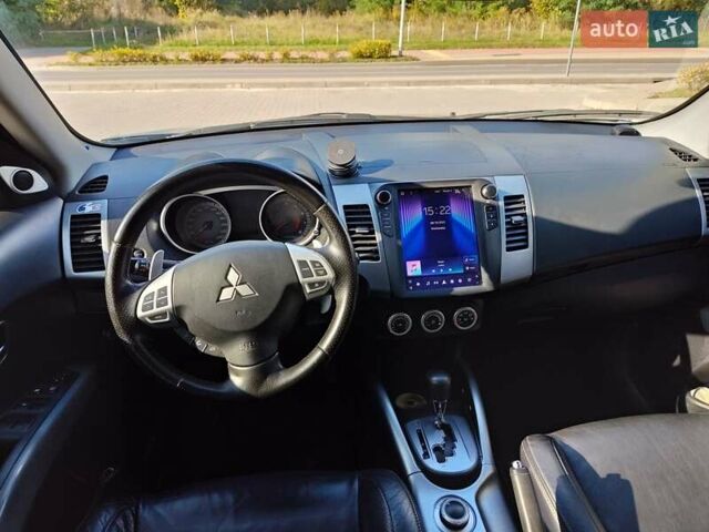 Серый Мицубиси Аутлендер, объемом двигателя 2.4 л и пробегом 256 тыс. км за 8100 $, фото 6 на Automoto.ua