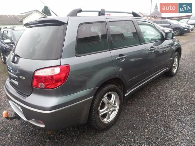 Серый Мицубиси Аутлендер, объемом двигателя 2 л и пробегом 232 тыс. км за 5950 $, фото 3 на Automoto.ua