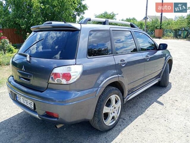 Серый Мицубиси Аутлендер, объемом двигателя 2.35 л и пробегом 342 тыс. км за 6900 $, фото 9 на Automoto.ua