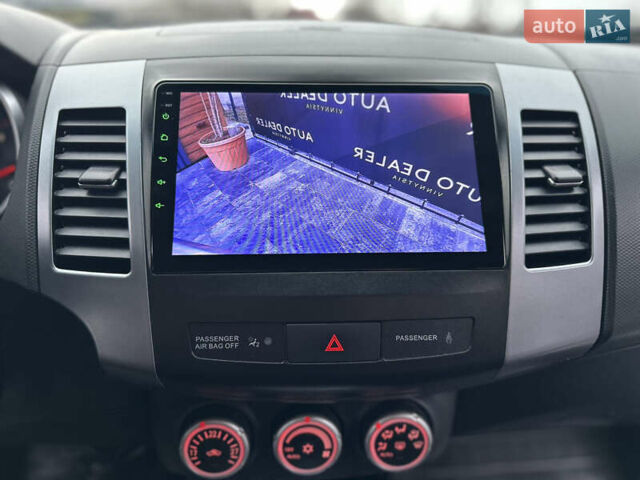 Серый Мицубиси Аутлендер, объемом двигателя 2.4 л и пробегом 61 тыс. км за 11300 $, фото 57 на Automoto.ua