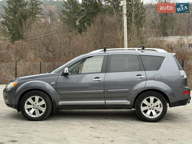 Сірий Міцубісі Аутлендер, об'ємом двигуна 2 л та пробігом 237 тис. км за 8999 $, фото 25 на Automoto.ua