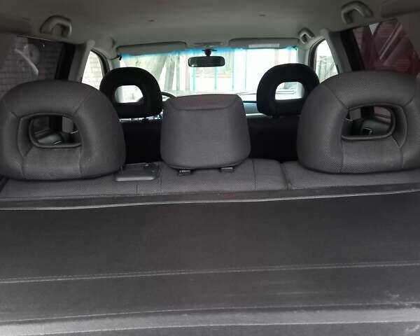 Серый Мицубиси Аутлендер, объемом двигателя 2.38 л и пробегом 143 тыс. км за 7300 $, фото 4 на Automoto.ua