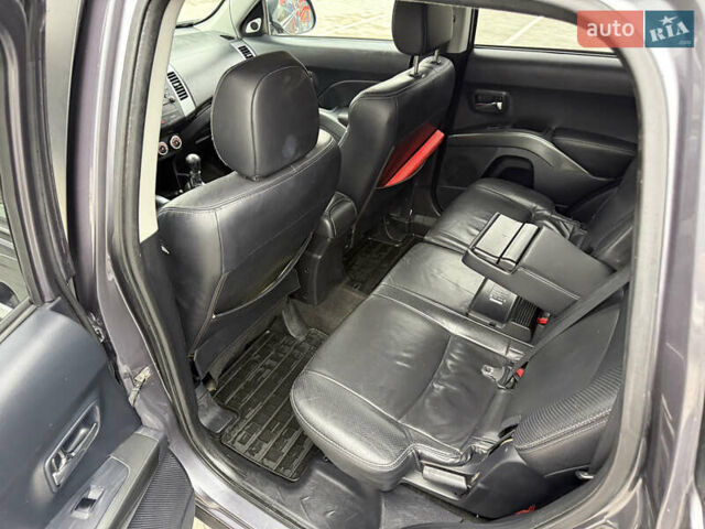 Сірий Міцубісі Аутлендер, об'ємом двигуна 2 л та пробігом 237 тис. км за 8999 $, фото 38 на Automoto.ua