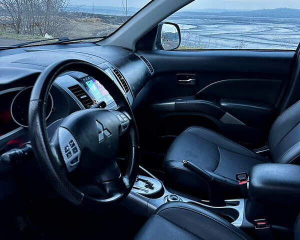 Сірий Міцубісі Аутлендер, об'ємом двигуна 2.4 л та пробігом 273 тис. км за 8400 $, фото 5 на Automoto.ua